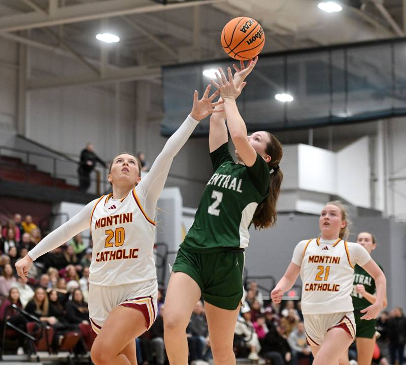 Montini's Lily Spanos, left, defends a shot by Grayslake Central's Mosey Drevline during the Hersey Class 3A supersectional on Monday, March 3, 2025 in Arlington Heights.