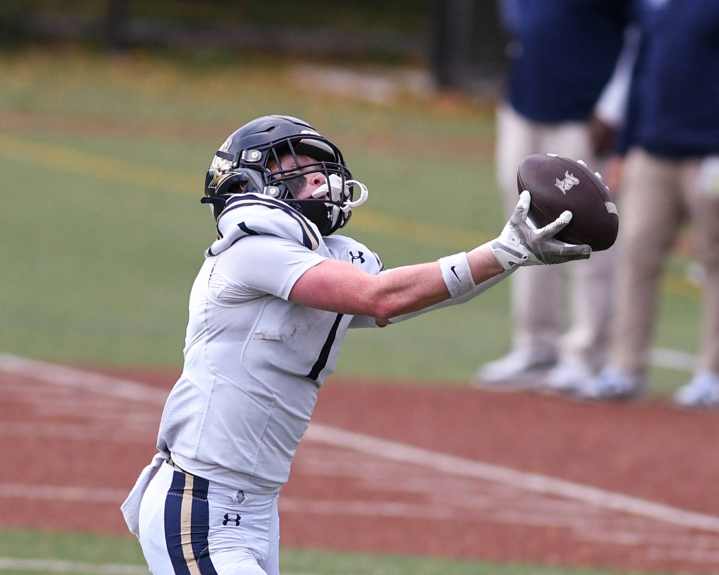 IC Catholic Prep's Will Schmidt (1) catches a pass and runs in for a touchdown during the 3A Playoff game against Chicago Hope Academy on Saturday Nov. 1, 2025, held at Altgeld Park in Chicago.