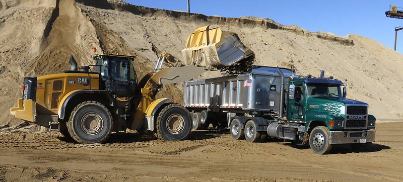 Sand is loaded into a truck Friday, Feb. 10, 2023, at Thelen Sand and Gravel, 28955 W. Route 173 in Fox Lake.