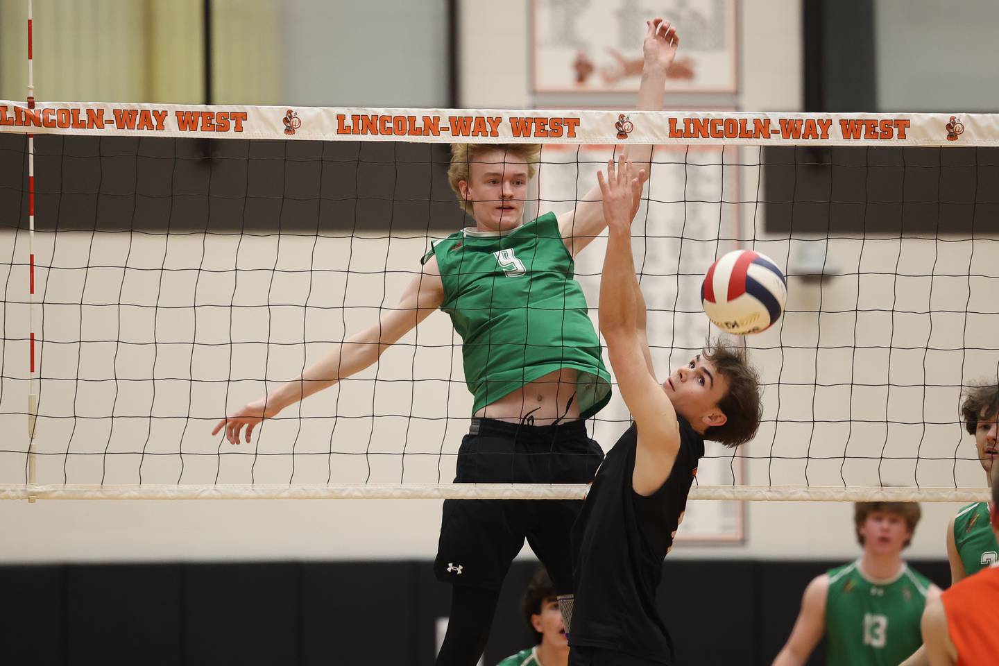 Providence’s Hayden Hill knocks down a shot behind Lincoln-Way West’s Noah Konopack on Wednesday, April 3, 2024 in New Lenox.