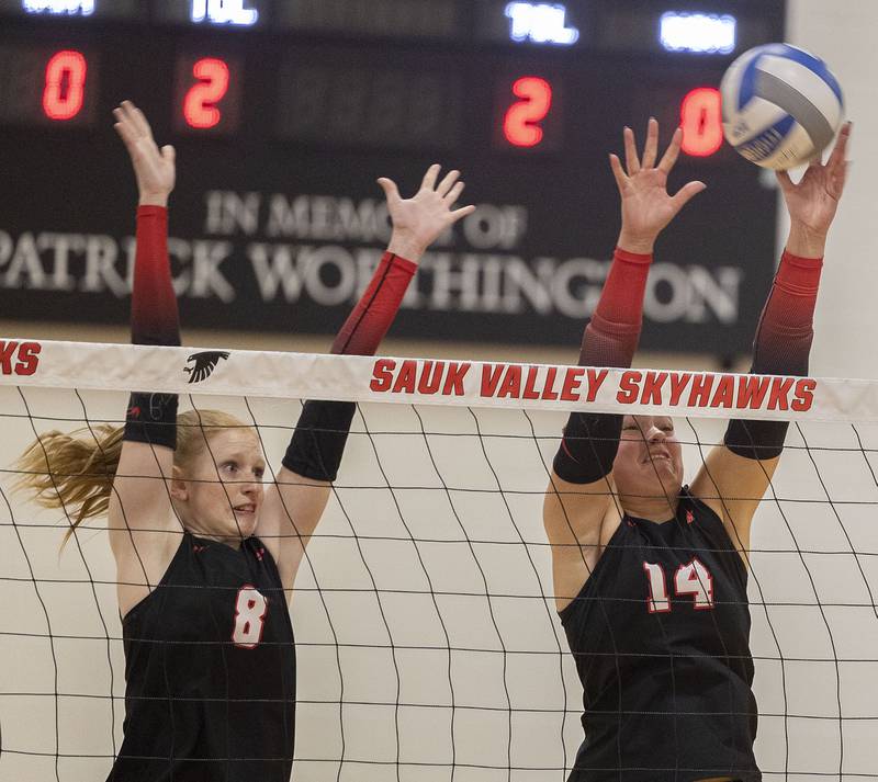 Sauk Valley’s Madyson Tichler (left) and Kailee Williams go up for a block against Triton College Wednesday, Nov. 5, 2025, during the Regional IV tournament.