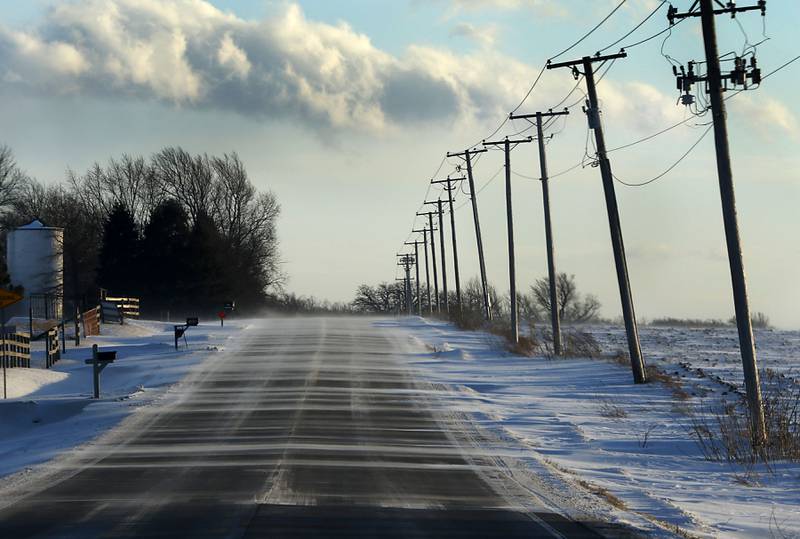 Snow blows across Greenwood Road near on Thursday, Jan. 22, 2026.
