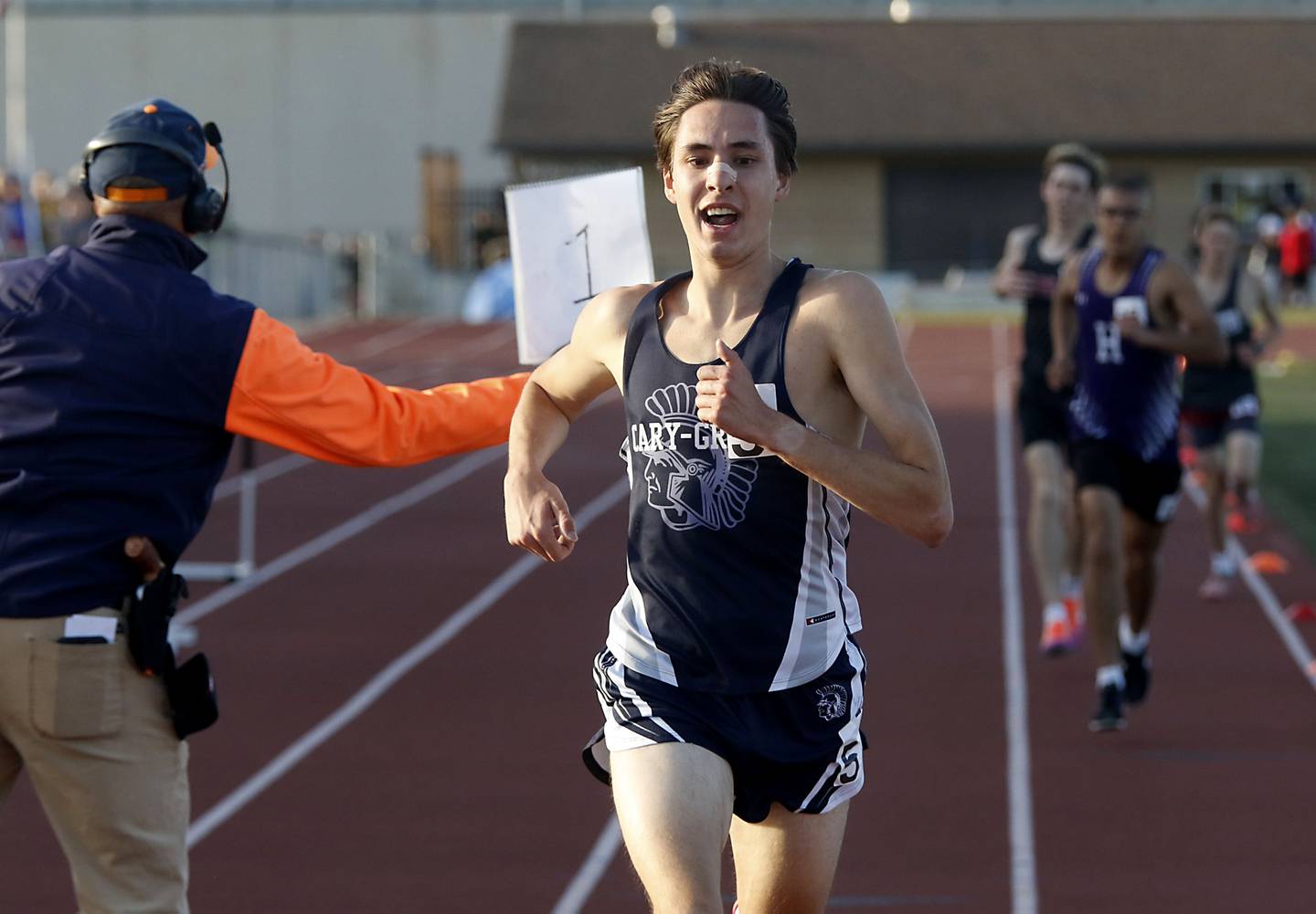 Cary-Grove's Jameson Tenopir cruises to victory as he runs the 3200 meter run during the Fox Valley Conference  Boys Track and Field Meet on Thursday, May 14, 2026, at Huntley High School.
