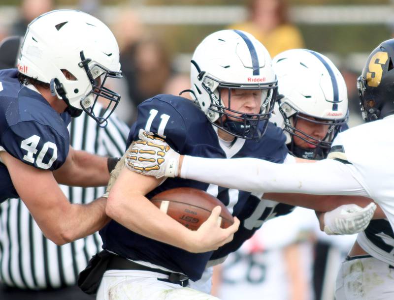 Cary-Grove’s Jackson Berndt runs the ball against Sycamore in IHSA football Class 5A first-round playoff action at Al Bohrer Field on the campus of Cary-Grove High School in Cary on Saturday, November 1, 2025.