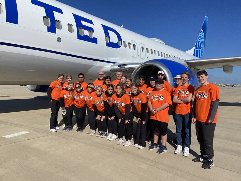 A team of 20 McHenry Community High School strength students pulled a United Airlines 737 to raise money for the Illinois Special Olympics on Saturday, October 1, 2022 at O’Hare International Airport.