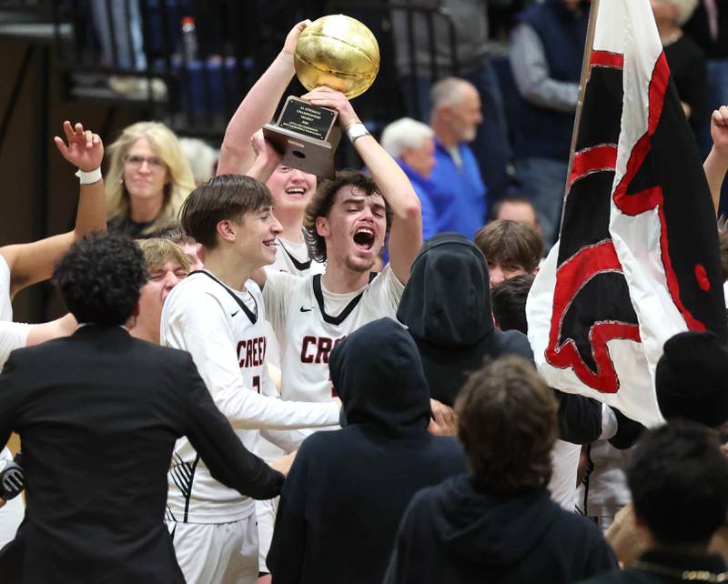 Indian Creek players celebrate winning the Little 10 Conference championship with their fans Friday, Feb. 6, 2026, after defeating IMSA at Somonauk High School.