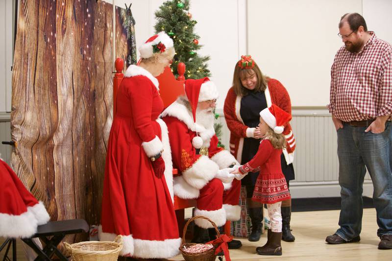 Audrey Magiera, 5, of Batavia visits with Santa during breakfast with Santa at Batavia Park District on Saturday, Dec. 9, 2023 in Batavia.