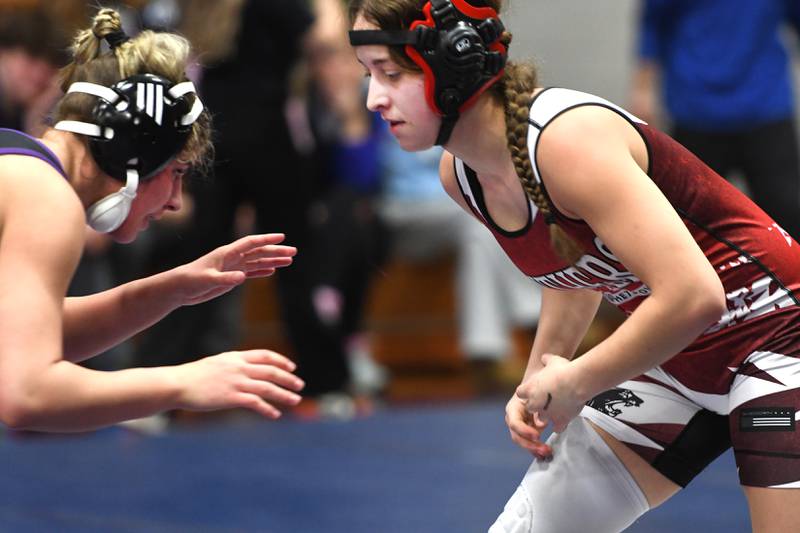 Erie-Prophetstown's Michelle Naftzger (right) battles Hononegah's Bella Castelli in the 135 pound championship match at the Belvidere Regional on Saturday, Feb. 7, 2026.