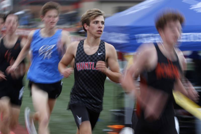 Huntley’s Tommy Nitz runs the 3200 meter run during the Fox Valley Conference Boys Track and Field Meet on Thursday, May 9, 2024, at Huntley High School.