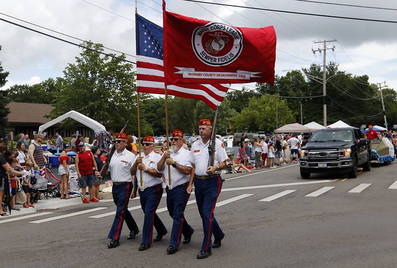 Members of the McHenry County Marine Corps League carries the American Flag  on Sunday, July 6, 2024, during Crystal Lake’s annual Independence Day Parade on Dole Avenue in Crystal Lake.