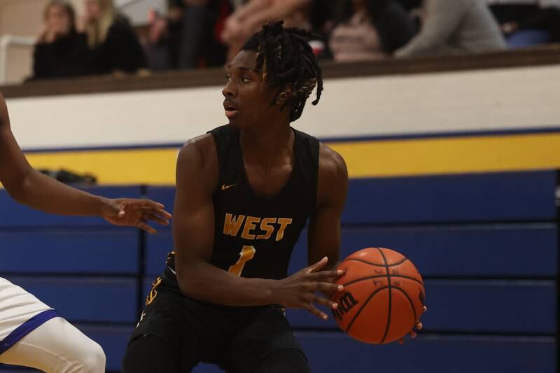 Joliet West’s Justus McNair looks to pass against Joliet Central.
