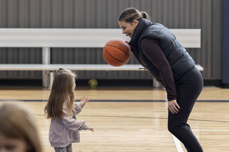 Maryssa Albert goes to work on a young "defender," her 4-year-old daughter Stella, Tuesday, Jan. 31, 2023 at The Facility in Dixon.