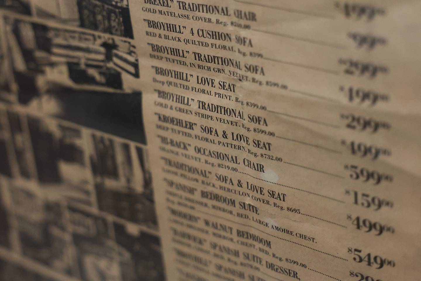 Turk Furniture, celebrating their 140th anniversary, displays a newspaper ad from 1974. Wednesday, Dec. 17, 2025 in Joliet.