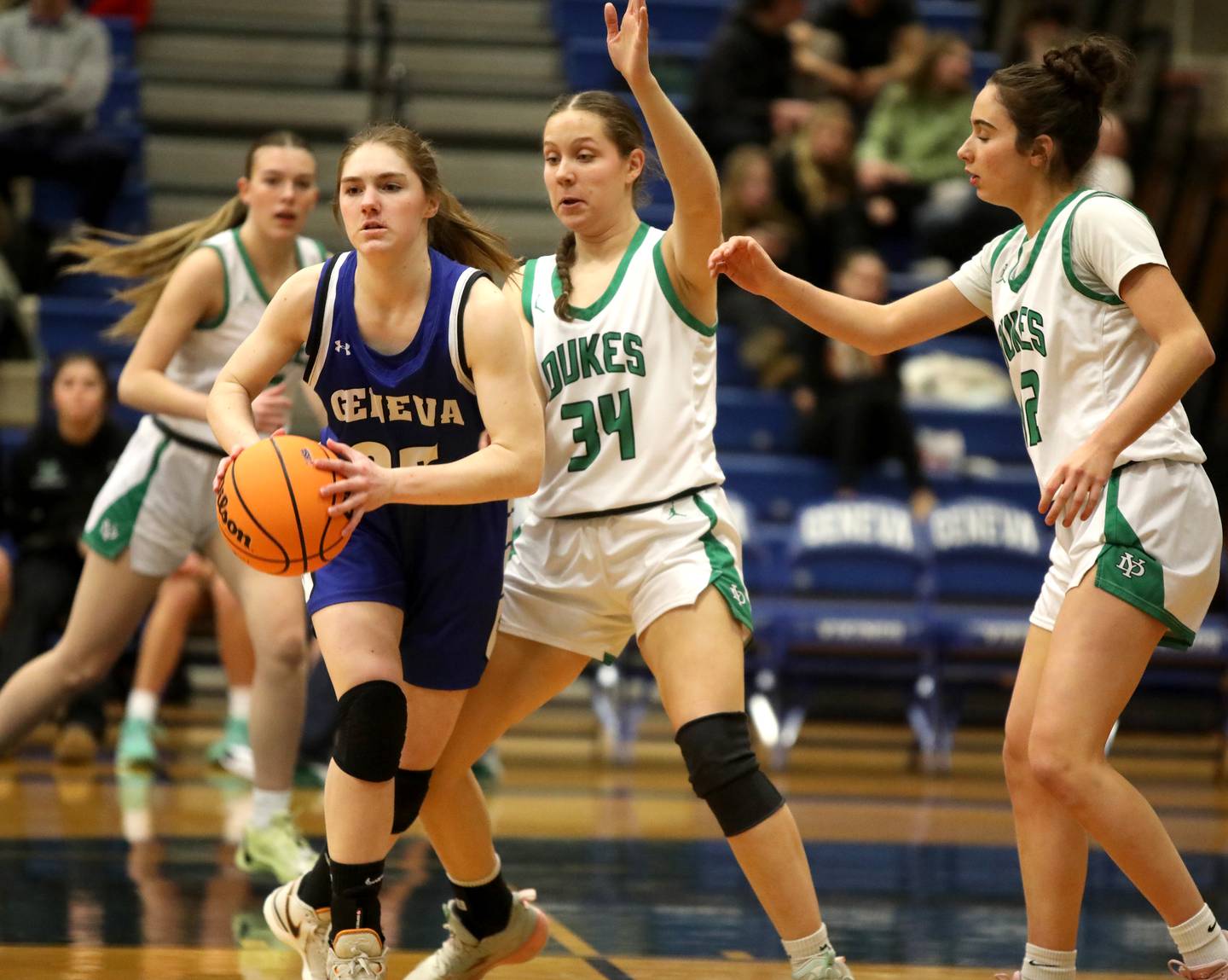 Geneva's Bridget Hecker looks to pass the ball during a 4A Geneva Regional semifinal game against York on Tuesday, Feb. 18, 2025 in Geneva.