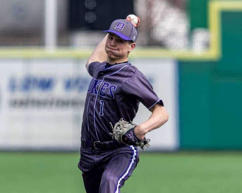 Dixon's Alex Harrison (1) delivers a pitch during baseball game between Dixon at Hampshire.  March 28, 2024