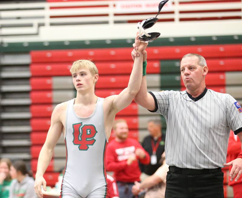 L-P's Reegan Kellett wins his match against Streator's Garritt Benstine during a meet on Wednesday, Dec. 13, 2023 in Sellett Gymnasium at L-P High School.