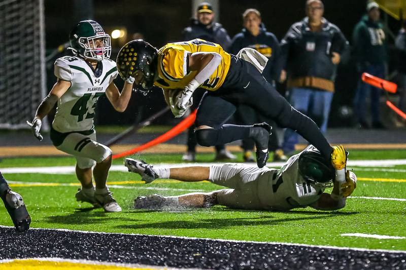 Joliet West's Joseph Durak (22) dives into the endzone during a football game between Plainfield Central at Joliet West on Friday, Oct 25th, 2024  in Joliet.