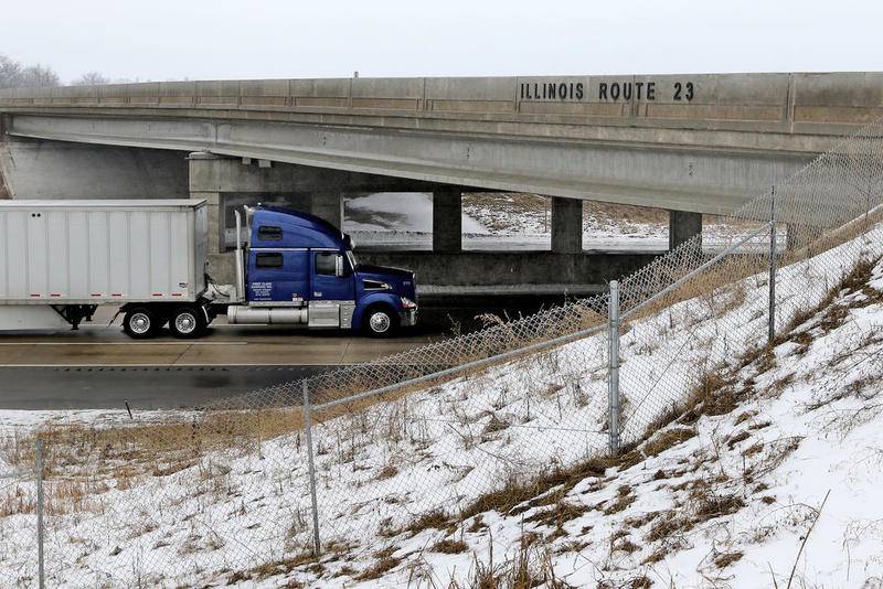 A semitractor-trailer travels toward the Route 23 overpass Wednesday along Interstate 90 near Grossen Road in Marengo.