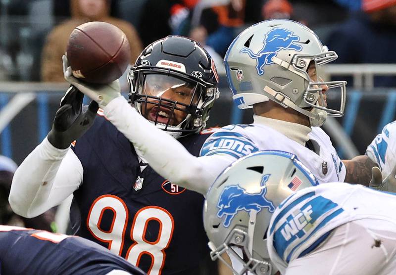 Chicago Bears defensive end Montez Sweat gets to Detroit Lions quarterback Jared Goff as he gets rid of the ball during their game Sunday, Dec. 10, 2023 at Soldier Field in Chicago.