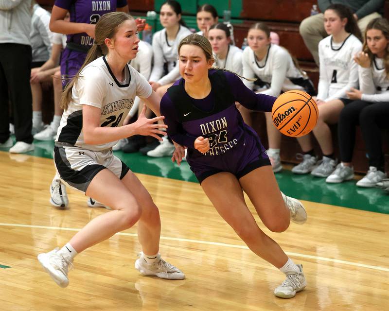 Dixon’s Reese Dambman goes baseline against Kaneland's Samantha Kerry during their Class 3A sectional semifinal game Tuesday, Feb. 25, 2025, at Boylan Catholic High School in Rockford.