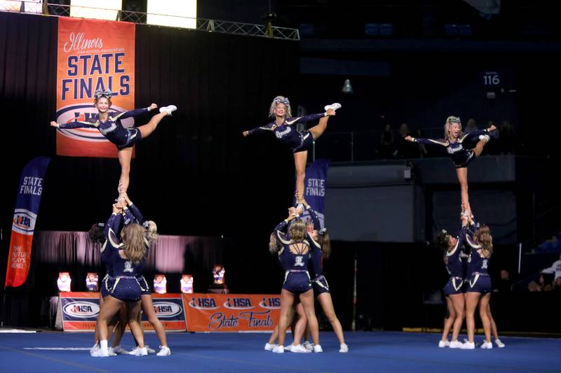 Members of the Lemont cheerleading team compete in the medium team division of the IHSA State Finals on Saturday, Feb. 8, 2025 at Grossinger Motors Arena in Bloomington.