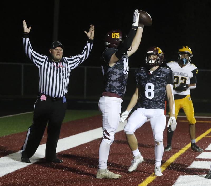 Richmond-Burton's Luke Bresnahan celebrates a touchdown catch during a Kishwaukee River Conference football game on against Harvard Thursday, Oct.12, 2023, at Richmond-Burton High School.