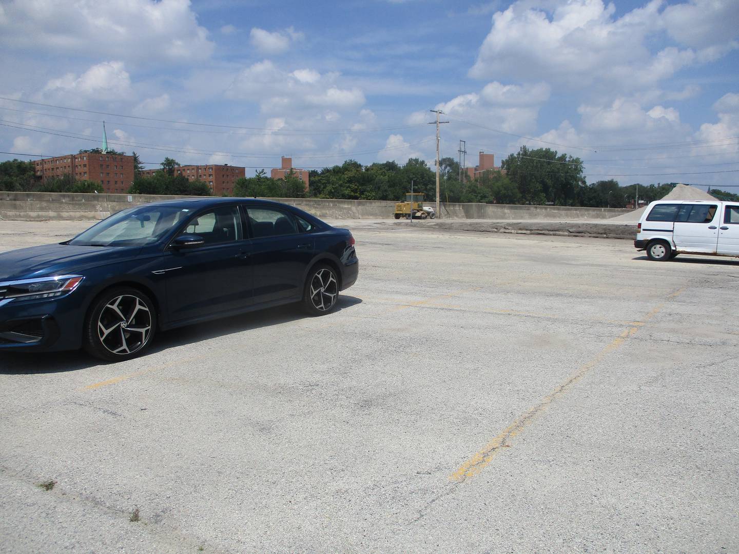 A few vehicles are seen in the city of Joliet's Riverwall parking lot on Wednesday. Aug. 6, 2025