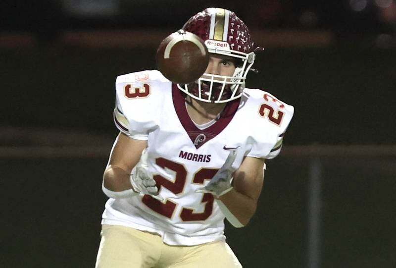 Morris' AJ Zweeres hauls in a screen pass during their game against Sycamore Friday, Oct. 21, 2022, at Sycamore High School.