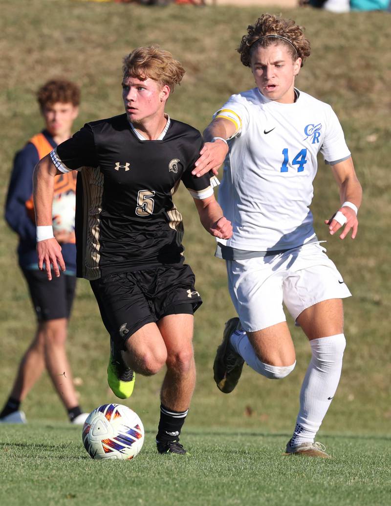 Sycamore's Aiden Sears and Burlington Central's Noah Rosborough go after the ball Wednesday, Oct. 23, 2024, during their Class 2A Sycamore Regional semifinal.