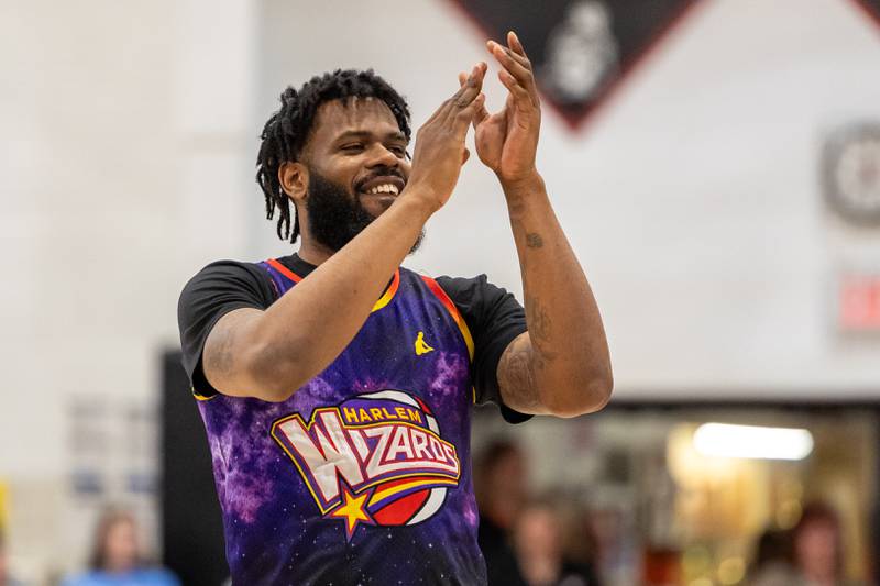Deven “Just Do It” Dorsett (10) of the Harlem Wizards claps on Wednesday, April 16, 2025 at Woodland High School in Streator.
