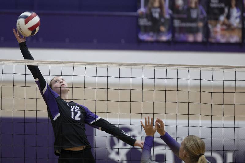 Dixon’s Izzy Queckboerner plays a shot against Rochelle Thursday, August 28, 2025.
