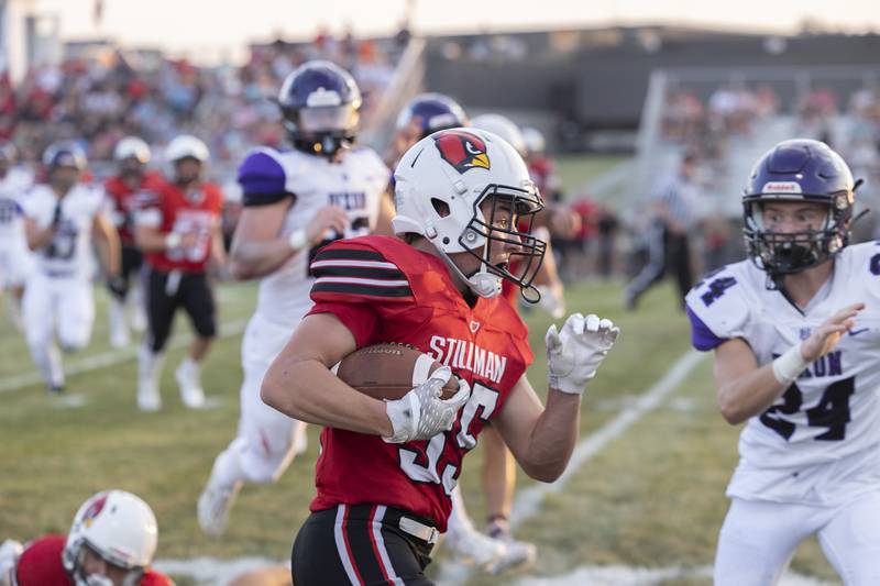 Stillman’s Henry Hildreth looks for running room as Dixon's Carter Kibble (24) chases him down Friday, August 25, 2023.
