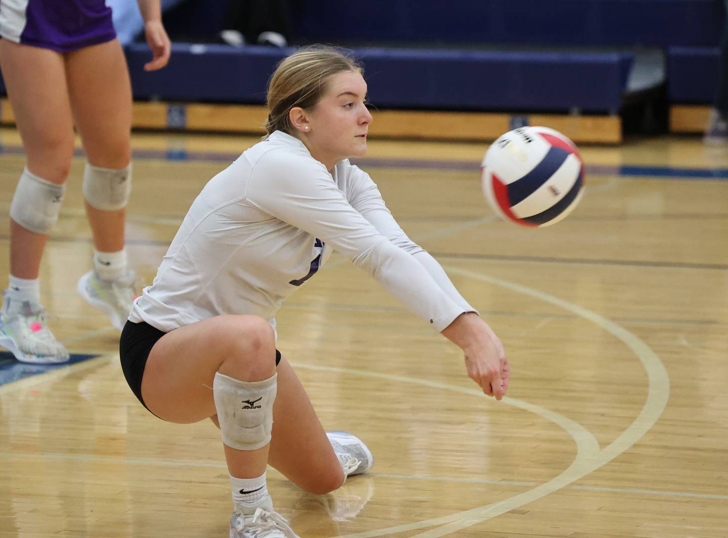 Downers Grove North’s Abby Gross (1) bumps a serve against Lyons Township during the 4A girls varsity volleyball regional final match at Riverside Brookfield high school on Thursday, Oct. 26, 2023 in Riverside, IL.