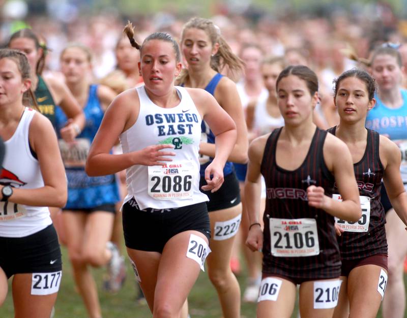 Oswego East's Olivia Van Denend competes in the Class 3A State Cross Country Championships on Saturday, Nov. 9, 2024 at Detweiller Park in Peoria.