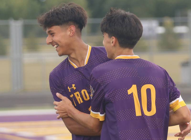 Mendota's Sebastian Carlos congratulates teammate Johan Cortez on scoring a goal over Streator