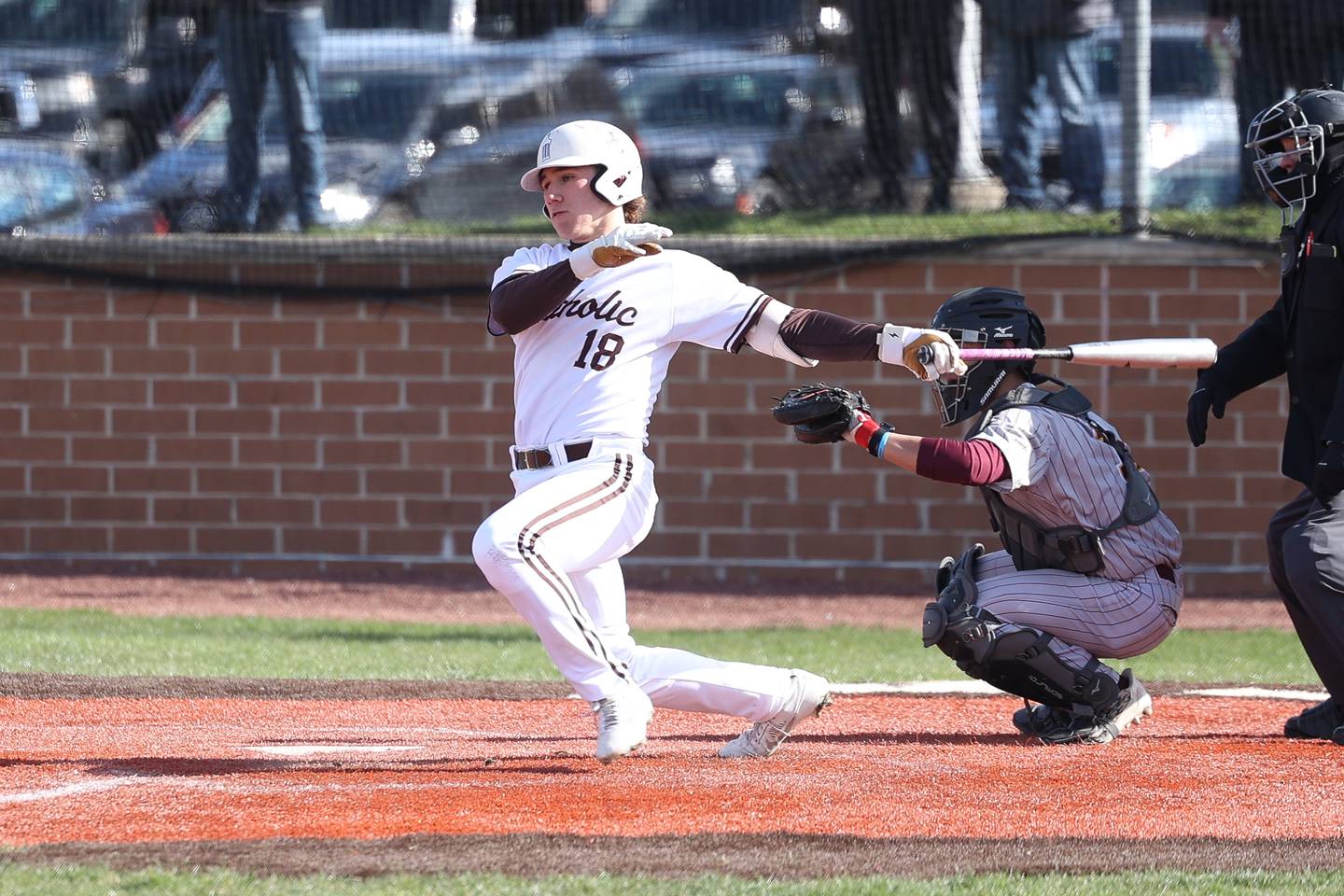 Joliet Catholic’s Zach Beitler drives in a run against Lockport on Wednesday, March 27, 2024 in Joliet.