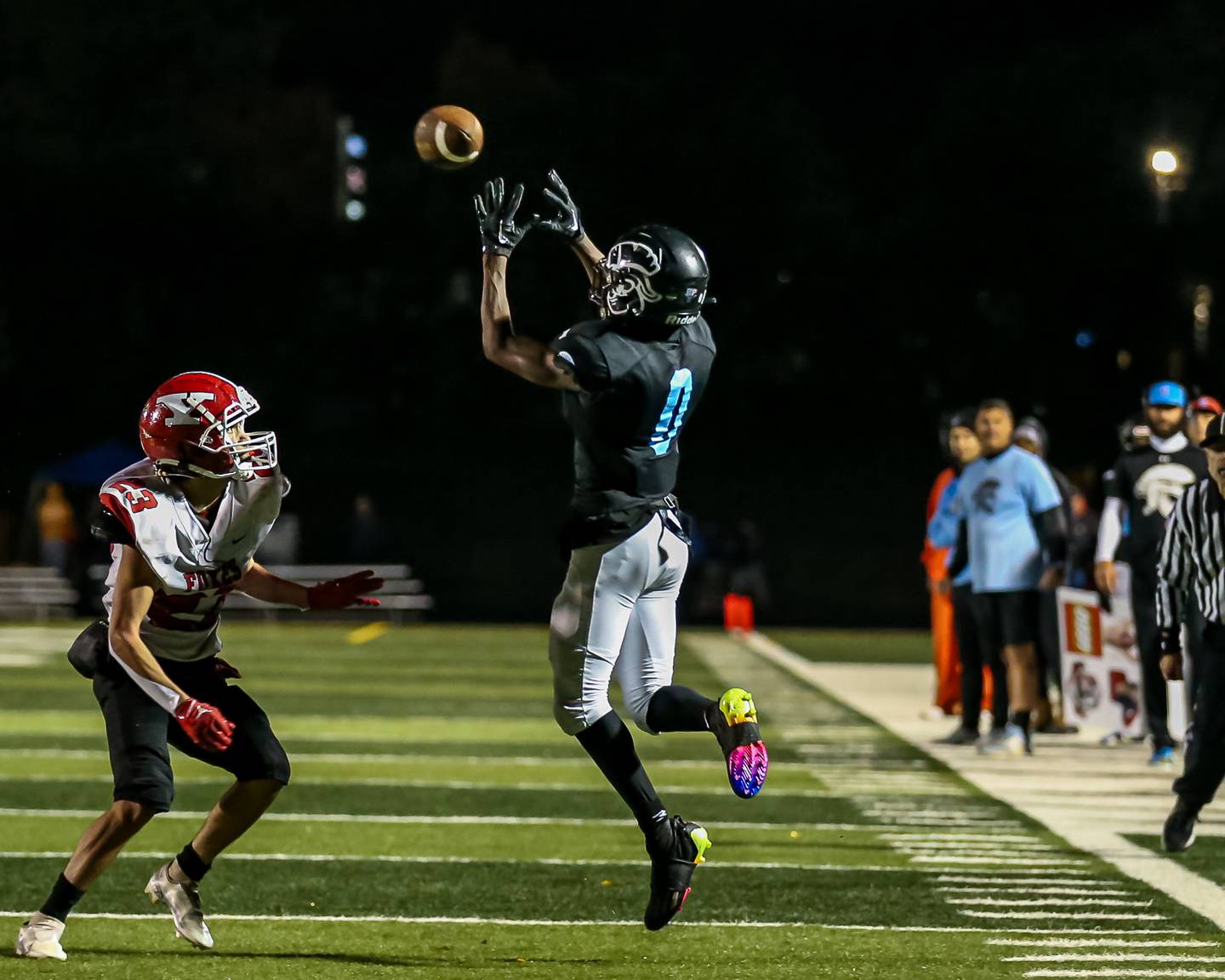Willowbrook's KJ Rhodes (0) looks in a catch during Class 7A football playoff game between Yorkville at Willowbrook.   Oct 27, 2023.