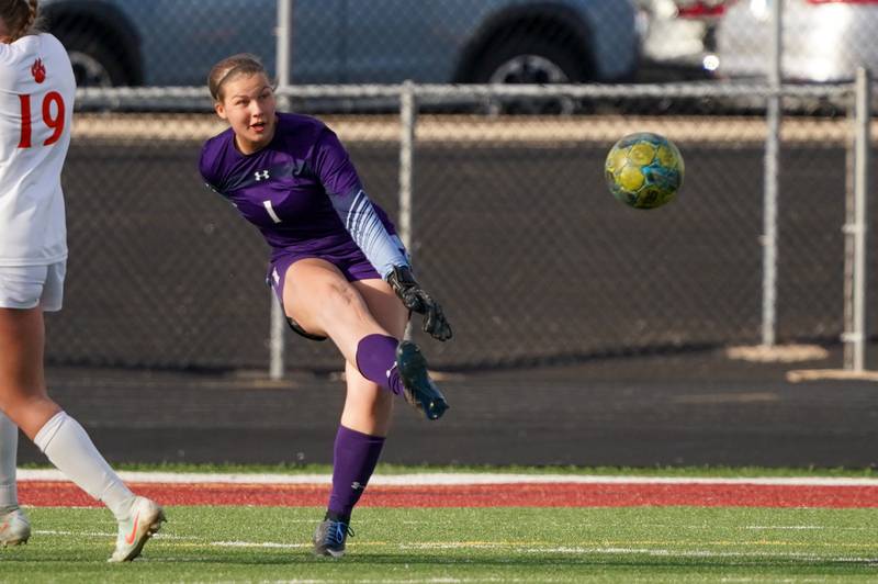 Oswego’s Natalie Gubricky (1) clears the ball on a goal kick  during a soccer mach in the Plainfield Classic against Bartlett at Plainfield North High School on Tuesday, April 15, 2025.