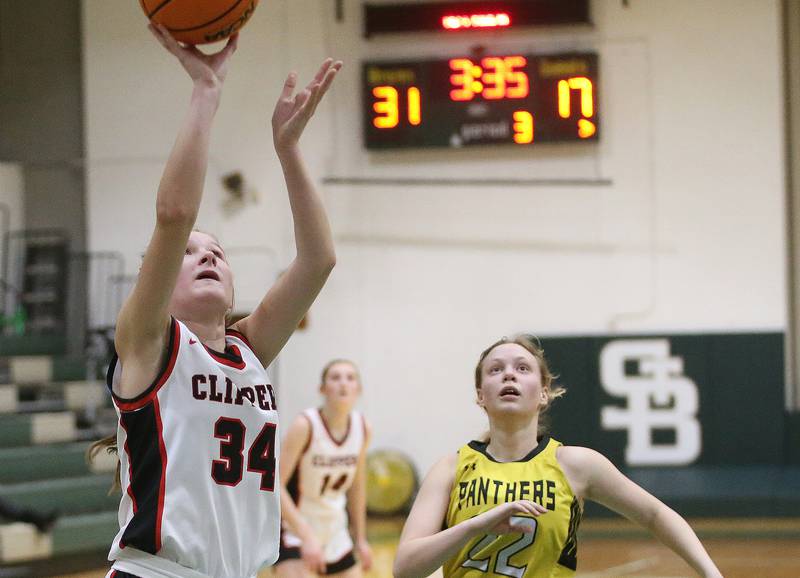 Amboy/Ohio's Bella Yanos takes a jump shot against Putnam County's Kacie Coleman during the Class 1A Regional semifinal game on Tuesday, Feb. 18, 2025 at St. Bede Academy.