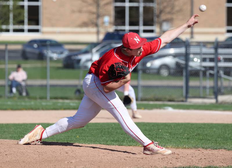 Naperville Central's Chase Reeder delivers a pitch during their game against DeKalb Tuesday, April 30, 2024, at DeKalb High School.