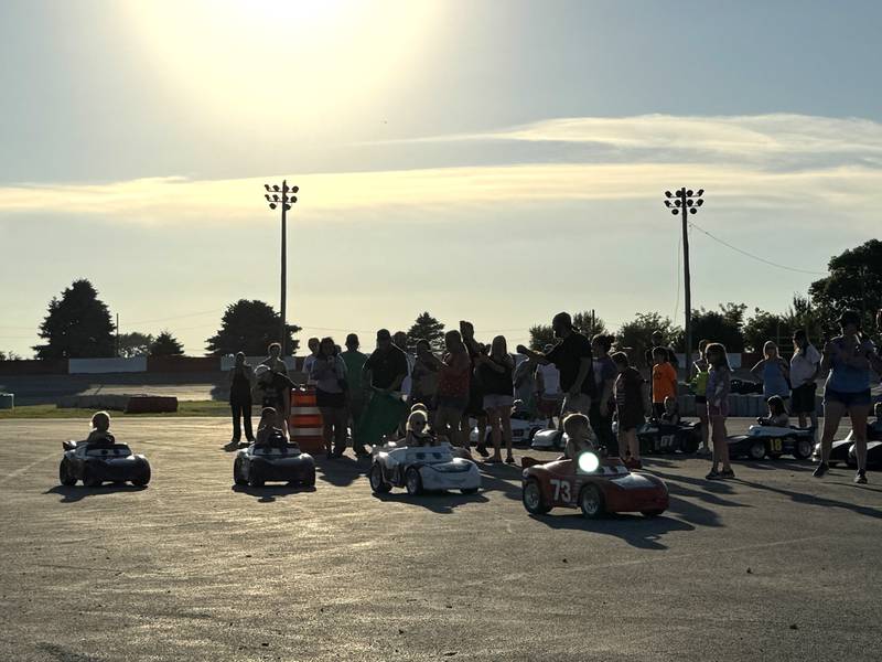 Kids take to the track for Cheryl Hryn Racing's annual Power Wheel Racing at the Grundy County Fair on Thursday, July 3, 2025.