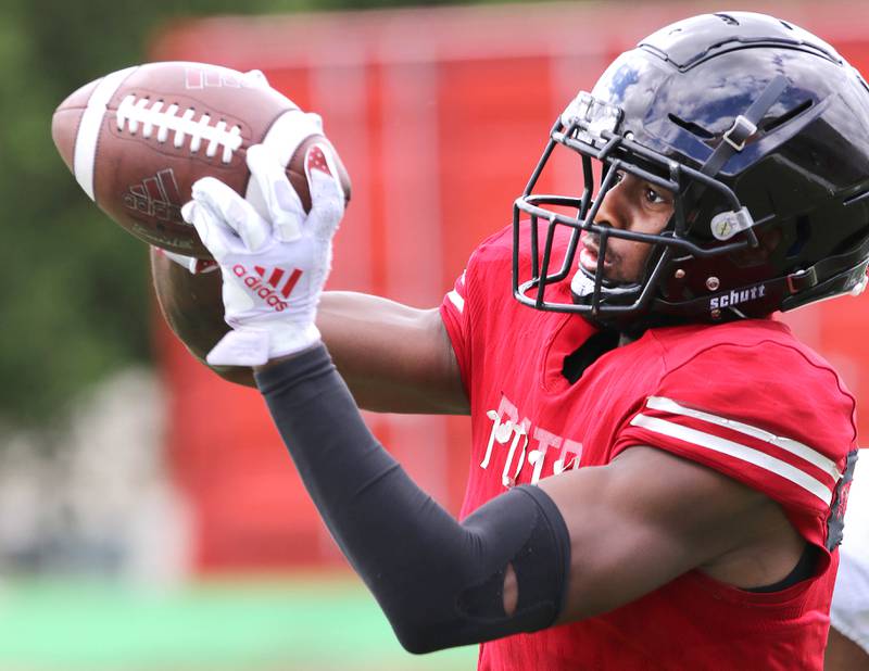 Northern Illinois Huskies wide receiver Jeremiah Howard makes a catch Tuesday, Aug. 9, 2022, during practice in Huskie Stadium at NIU.