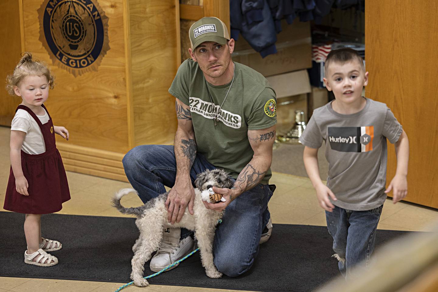 Sgt. Floyd Dunn, with daughter Rayne, 2, and son Gabriel, 6, is spearheading a 22 Mohawks Pups for Vets program for the state of Illinois. On Friday August 11, 2023 Dunn delivered his first pup to army veteran David Martinez of Chicago.