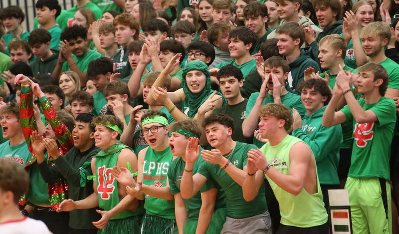L-P superfans cheer on the Cavaliers as they play Streator during the Class 3A Regional title game on Friday, Feb. 28, 2025 in Sellett Gymnasium at L-P High School.