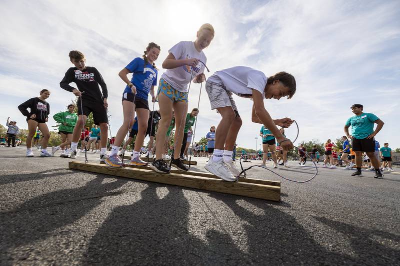 Freshman work together to get an obstacle moving Thursday, Sept. 19, 2024, during a BLIND retreat in Sterling. Students from Erie-Prophetstown, Newman, Morrison, Polo, Rock Falls and Fulton took part in the leadership building event.