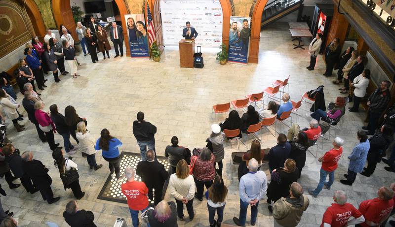 About 100 people gathered at the Kane County Courthouse in Geneva for CASA Kane Countys Hands Around the Courthouse event Thursday. Chief Judge Robert Villa was among the speakers.