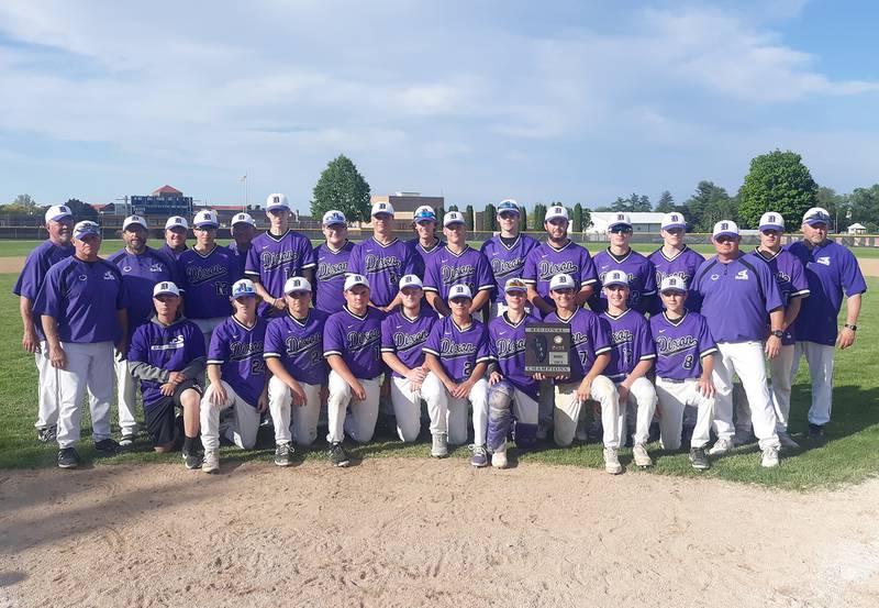 The Dixon Dukes pose with their championship plaque after winning the Class 3A Freeport Regional title on Saturday at Hustle Field.