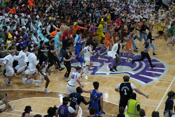 Princeton native John Washo works the famous ‘Silent Night’ game at Taylor University  
