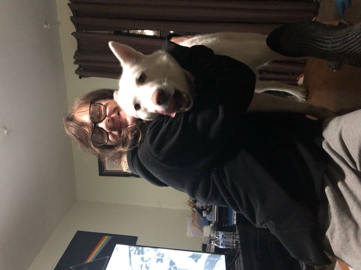 Nick Lindblad with the family dog a husky named     .