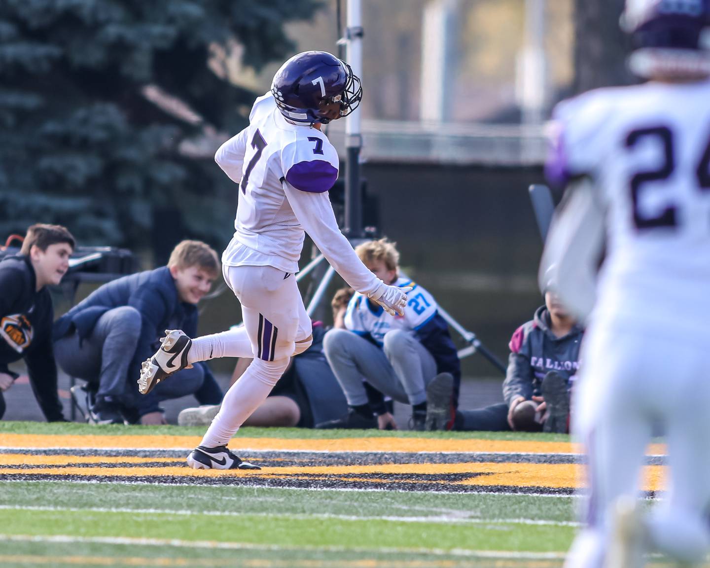 Dixon's Cort Jacobson (7) runs back an interception for a touchdown during Class 4A second round playoff football playoff game between Dixon at St Laurence.  Nov 4, 2023.